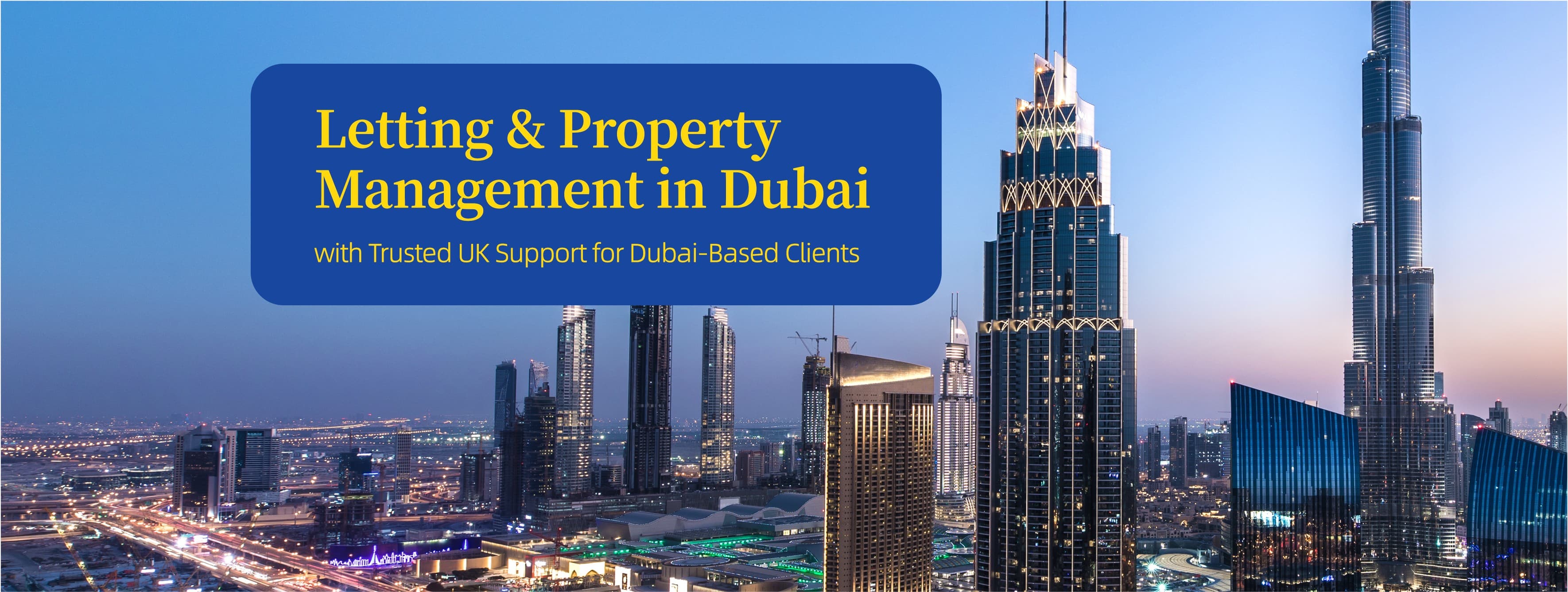 Night skyline of a modern city with illuminated skyscrapers